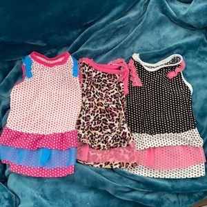 Lot of three dog dresses
